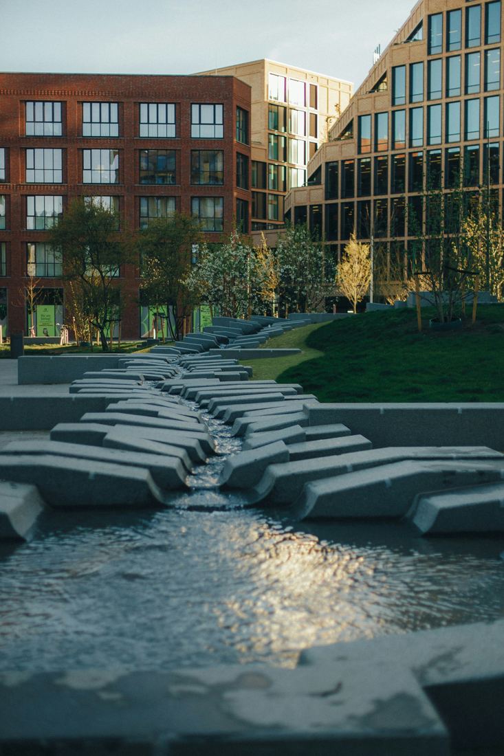 Communal water feature between apartment blocks
